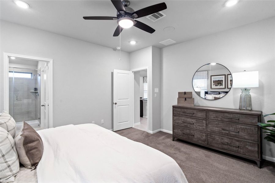 The well-designed layout offers private access from the sleeping area to a bright en-suite bath.