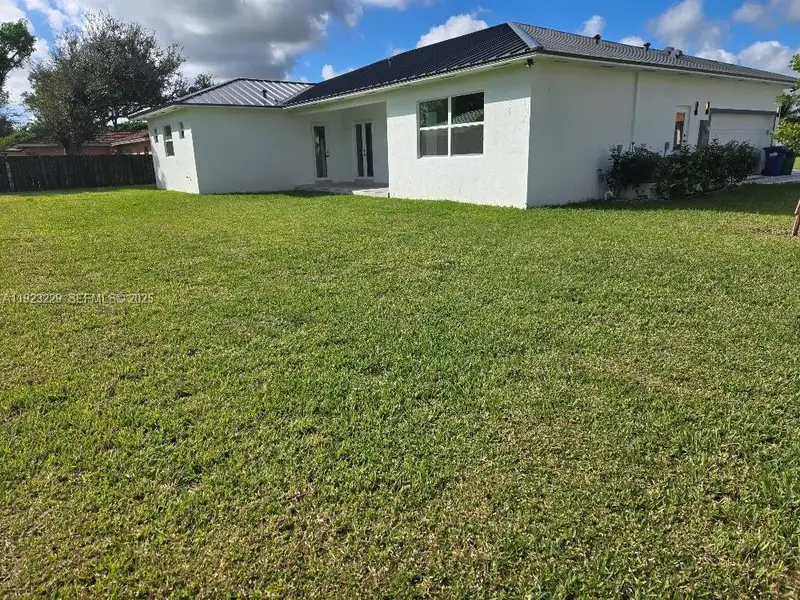 Exterior details and patio area of a home in , Miami (Image 3).