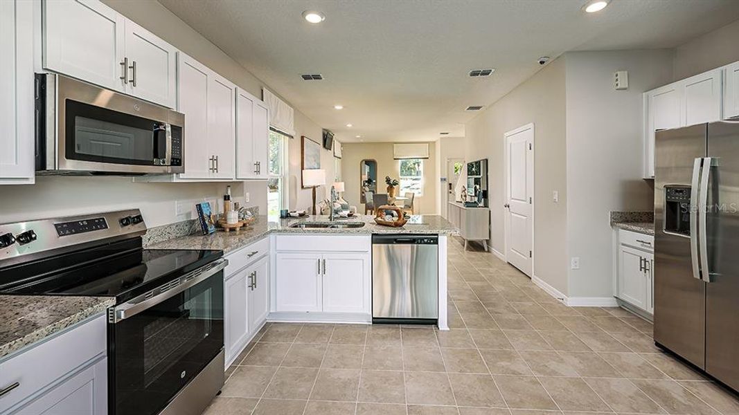 Furnished interior view inside a new home in Southloch, Mount Dora (Image 7).