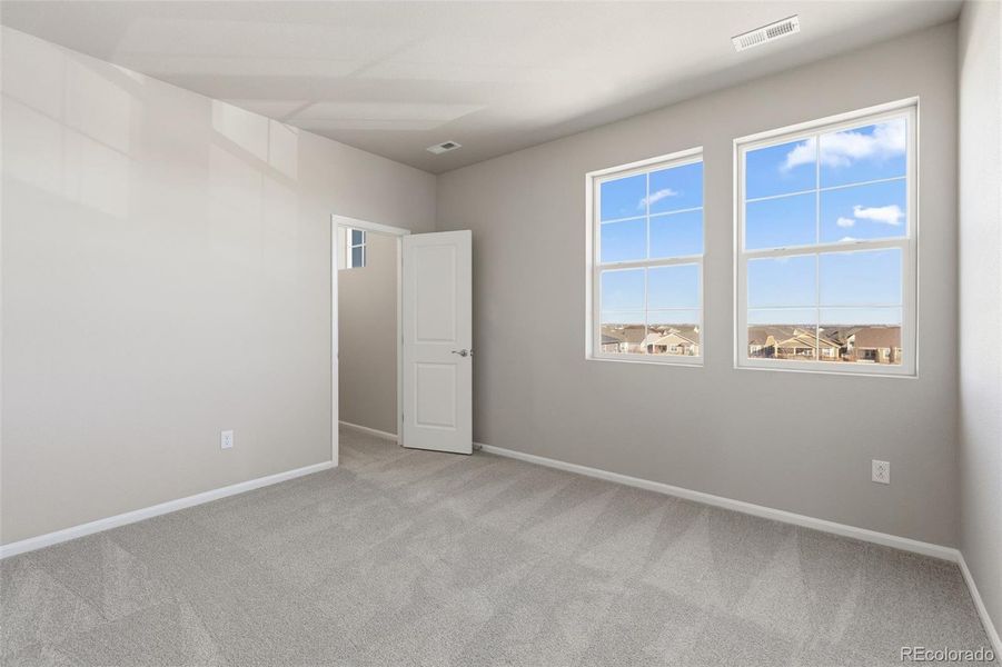 Spacious, unfurnished interior of a new home in Talon Pointe, Thornton (Image 22).