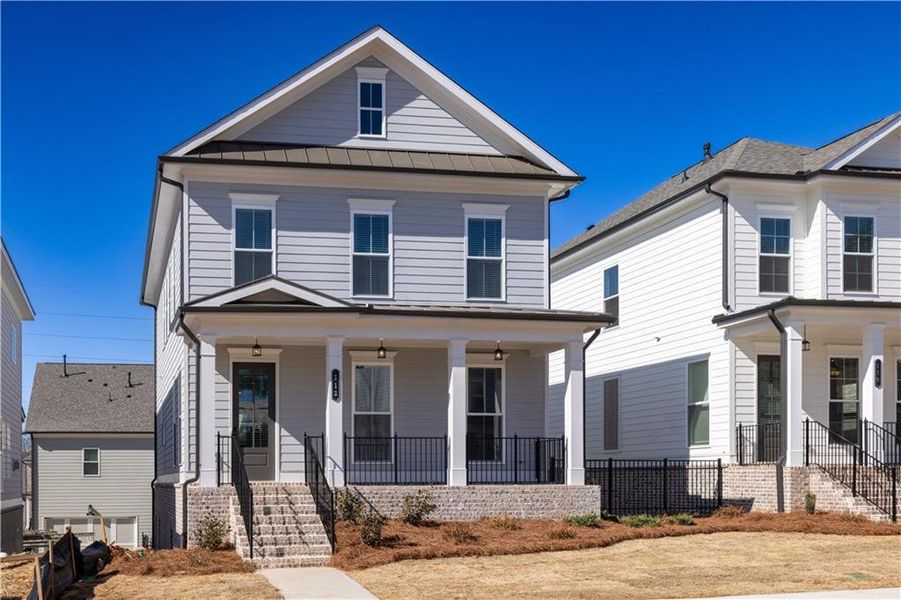 Front exterior of a new home in Brackley Single Family, Cumming, GA, highlighting curb appeal (Image 29).