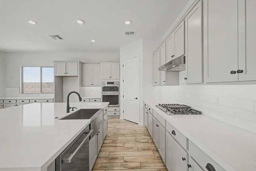 Furnished interior view inside a new home in Valencia at Granite Vista, Waddell (Image 7).