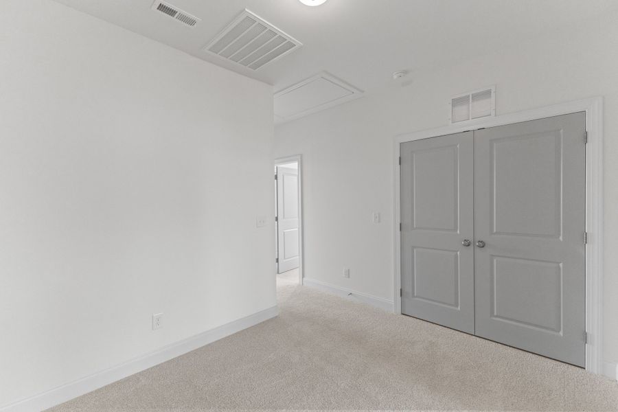 Representative unfurnished interior of a home built from the The Hemlock by RobuckHomes in Kennebec Crossing, Angier (Image 170).