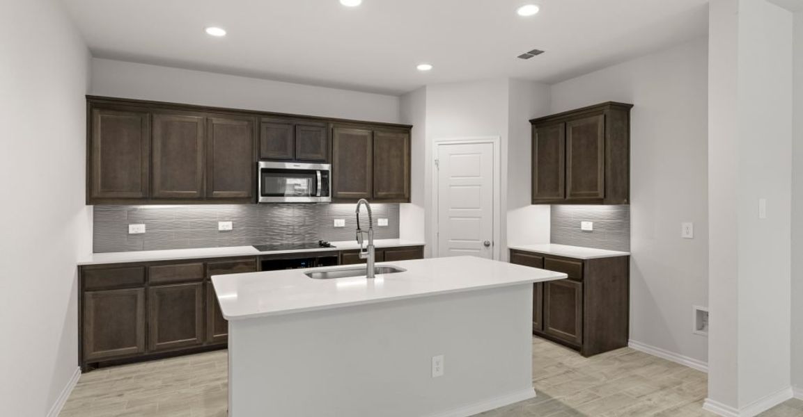 Representative exterior photo of a completed home built from the Hickory by Impression Homes in ValleyBrooke, Mesquite, TX (Image 7).