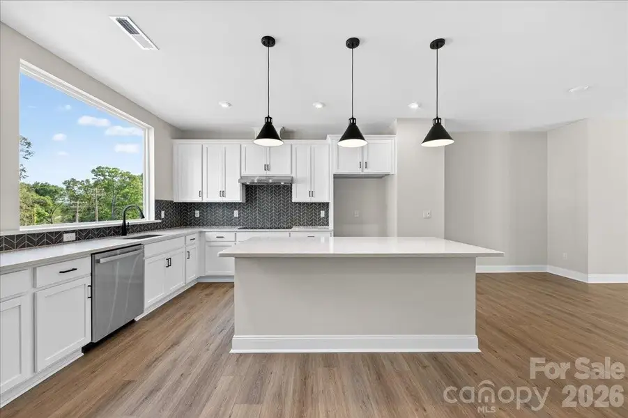 Gourmet Kitchen with Large window for ample natural light