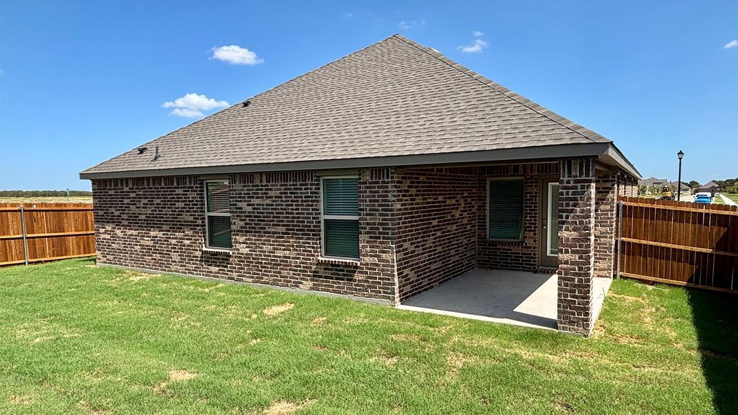 Exterior details and patio area of a home in Trailstone, Caddo Mills (Image 2). Exterior details and patio area of a home in Trailstone, Caddo Mills (Image 2).