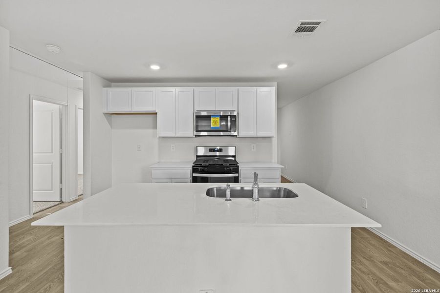 Furnished interior view inside a new home in Hickory Ridge, Elmendorf (Image 6).