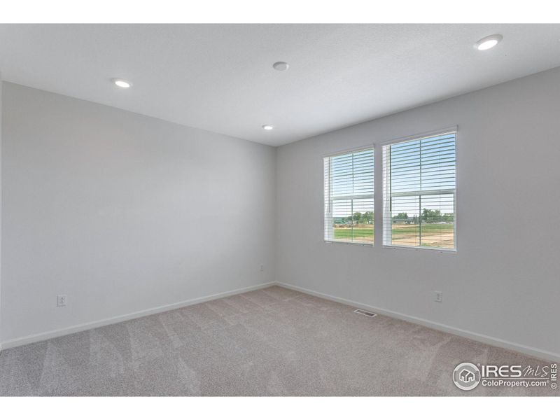 Spacious, unfurnished interior of a new home in Westside Crossing Townhomes, Berthoud (Image 29).