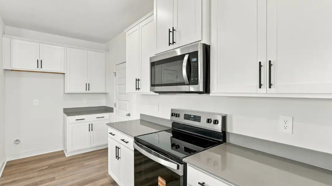 Furnished interior view inside a new home in The Lakes at North Glynn, Brunswick (Image 4).