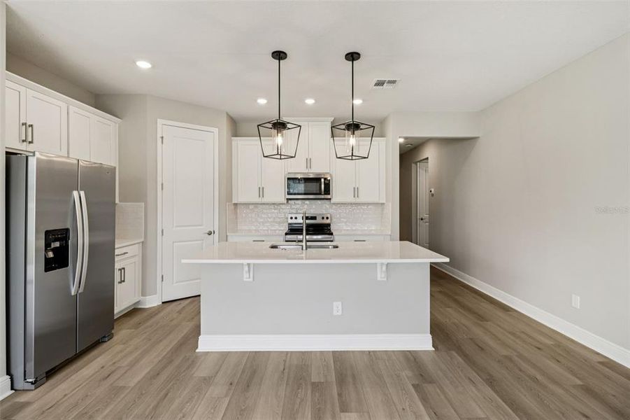 Furnished interior view inside a new home in Legends Preserve - Signature Series, Daytona Beach (Image 5).