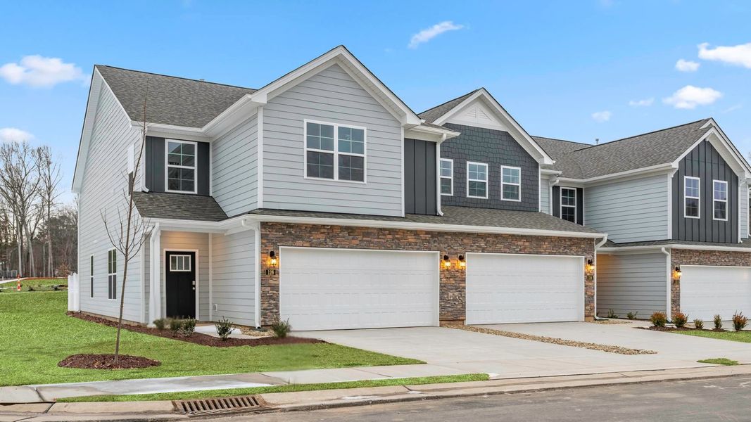 Front exterior of a new home in Lybrook Village, Advance, NC, highlighting curb appeal (Image 2). Front exterior of a new home in Lybrook Village, Advance, NC, highlighting curb appeal (Image 2).