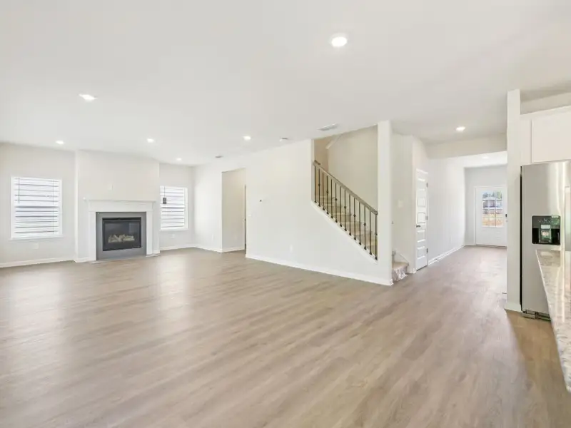 Spacious, unfurnished interior of a new home in Vines at Mill Creek - Estate Series, Braselton (Image 11).