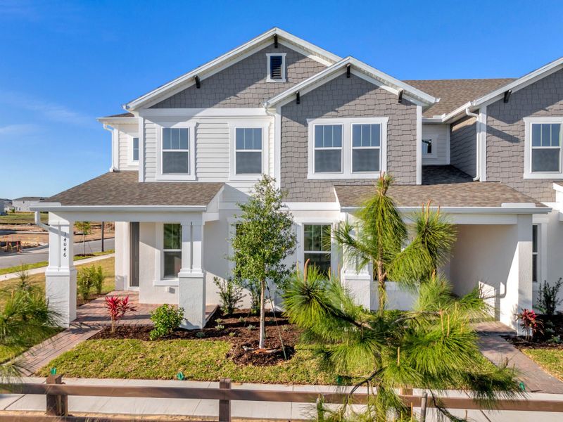 Representative exterior photo of a completed home built from the Franklin by Rockwell Homes in Harvest at Ovation - Townhomes, Winter Garden, FL (Image 28). Representative exterior photo of a completed home built from the Franklin by Rockwell Homes in Harvest at Ovation - Townhomes, Winter Garden, FL (Image 28).