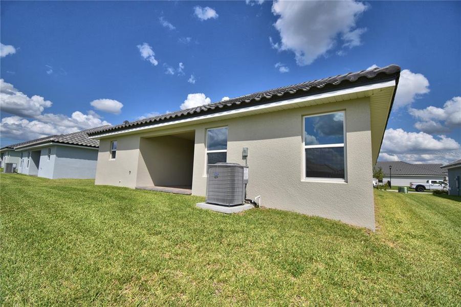 Exterior details and patio area of a home in Lake Juliana Estates, Auburndale (Image 3).