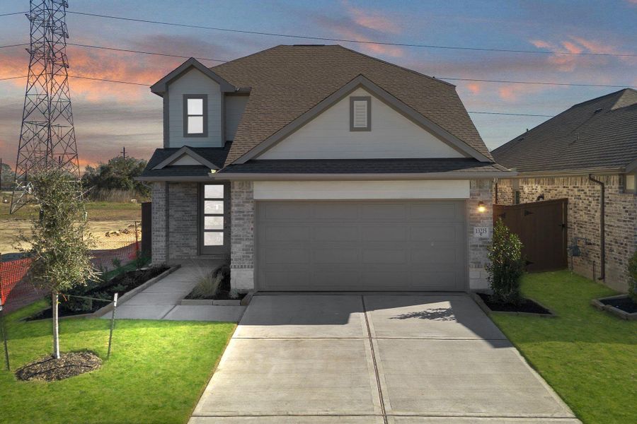 Front exterior of a new home in Creekhaven, Rosharon, TX, highlighting curb appeal (Image 1). Front exterior of a new home in Creekhaven, Rosharon, TX, highlighting curb appeal (Image 1).