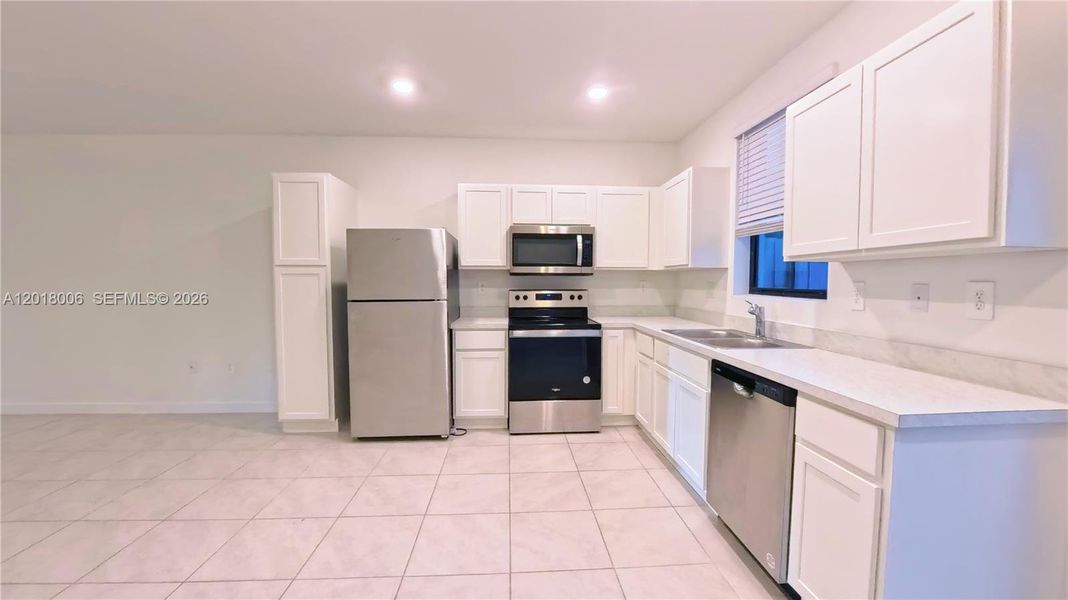 Furnished interior view inside a new home in , Florida City (Image 8).