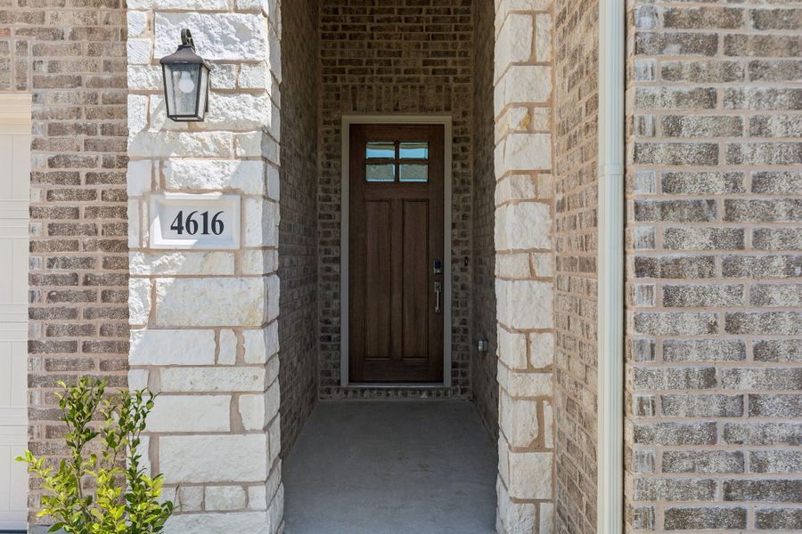 Exterior details and patio area of a home in Painted Tree Lakeside, McKinney (Image 3).
