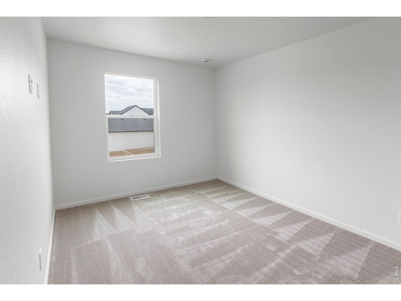 Spacious, unfurnished interior of a new home in Bloom Cottages, Fort Collins (Image 28).