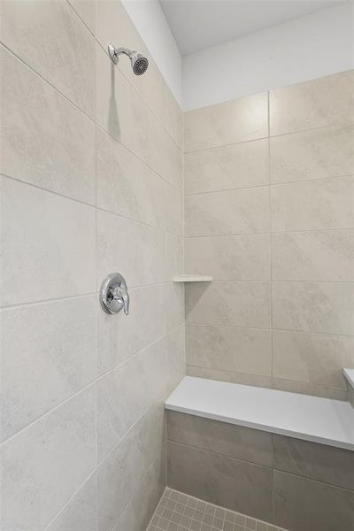 Bathroom with a tile shower Bathroom with a tile shower