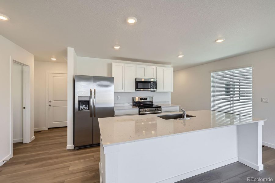 Furnished interior view inside a new home in Copper Chase: The Celestial Collection, Colorado Springs (Image 8).