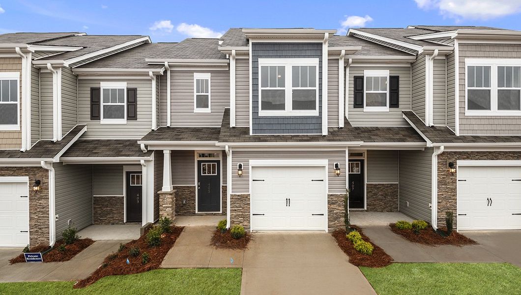 Front exterior of a new home in The Townes at Stonecrest, Hendersonville, NC, highlighting curb appeal (Image 1).