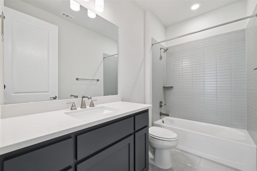 Full bathroom featuring vanity and tub / shower combination