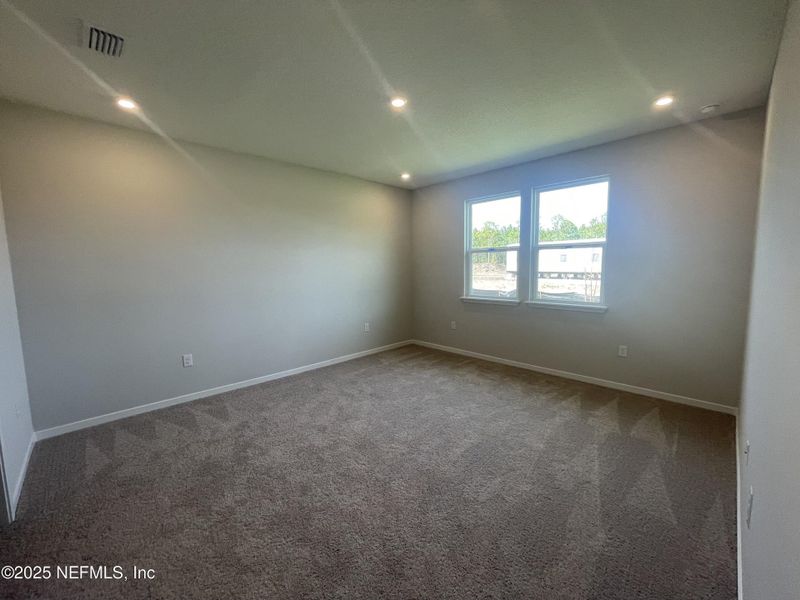 Spacious, unfurnished interior of a new home in Magnolia Series at Seminole Palms, Palm Coast (Image 23).