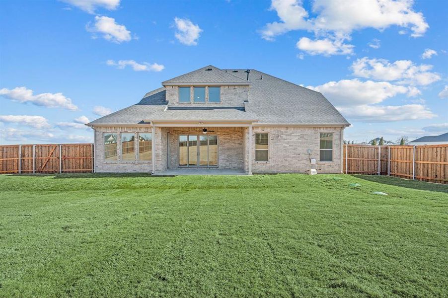 Exterior details and patio area of a home in Settlers Glen, New Fairview (Image 28).