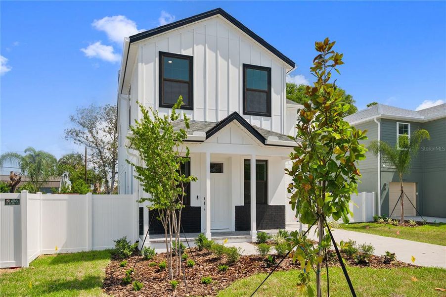 Front exterior of a new home in , St. Petersburg, FL, highlighting curb appeal (Image 2). Front exterior of a new home in , St. Petersburg, FL, highlighting curb appeal (Image 2).