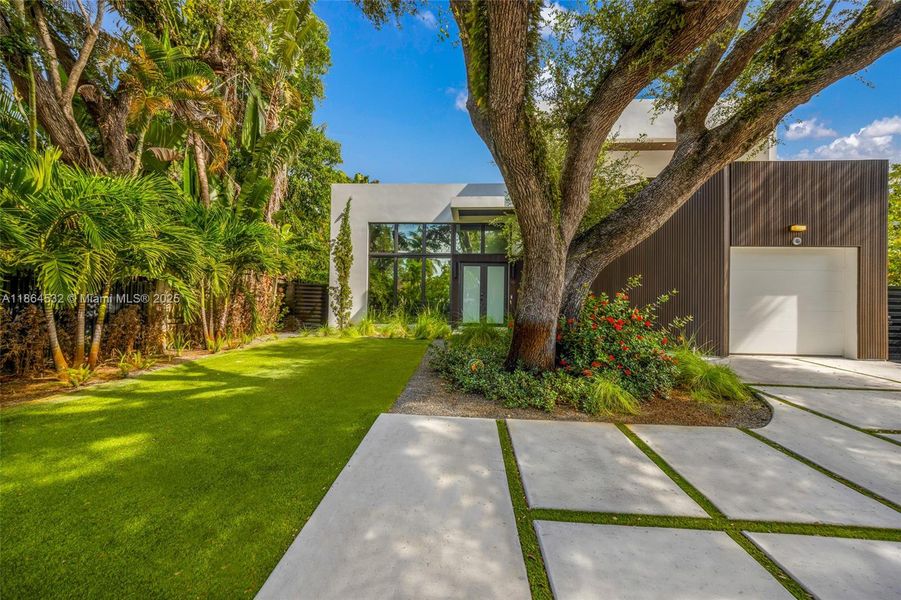 Front exterior of a new home in , Miami, FL, highlighting curb appeal (Image 21).