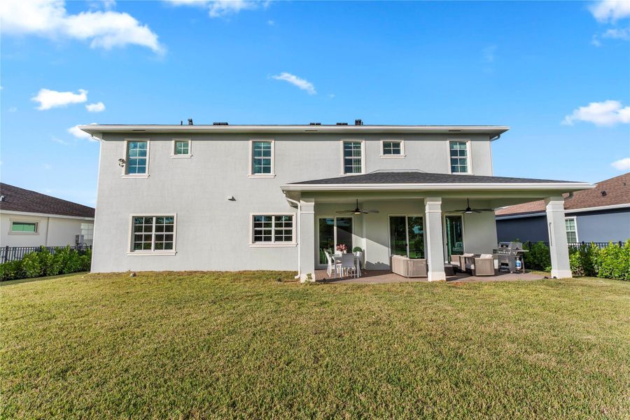 Exterior details and patio area of a home in Arden: The Waterford Collection, Loxahatchee (Image 23).