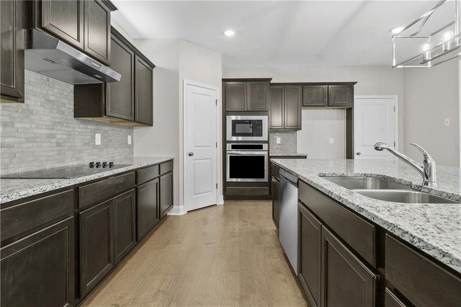 Furnished interior view inside a new home in Edenglen, Buford (Image 11).