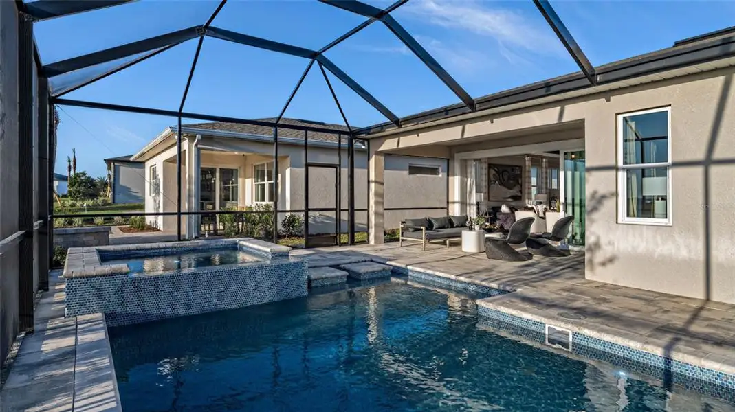 Exterior details and patio area of a home in Cresswind at Lake Harris, Tavares (Image 19).