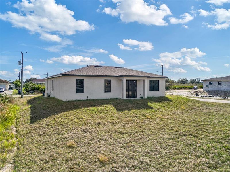 Exterior details and patio area of a home in , Lehigh Acres (Image 4).