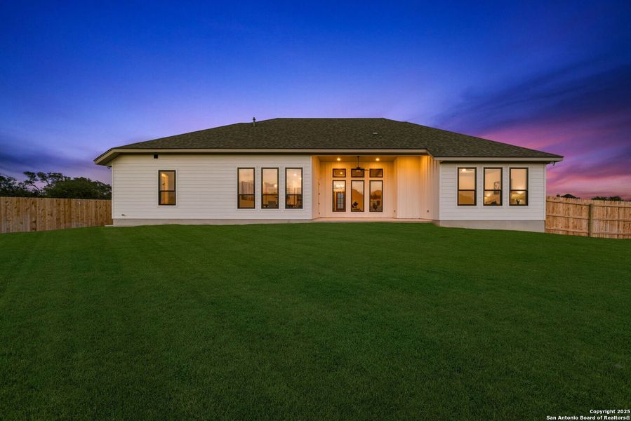 Front exterior of a new home in , Castroville, TX, highlighting curb appeal (Image 25). Front exterior of a new home in , Castroville, TX, highlighting curb appeal (Image 25).