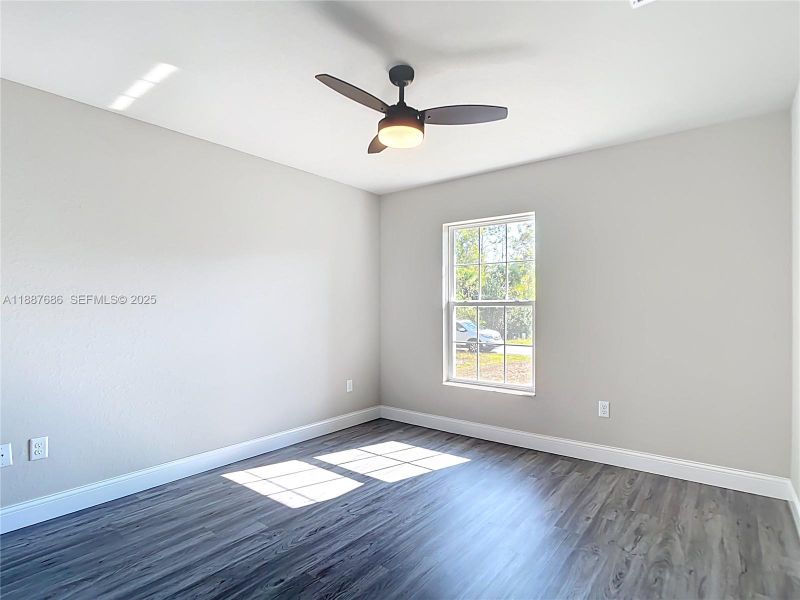 Spacious, unfurnished interior of a new home in , Port Charlotte (Image 18).
