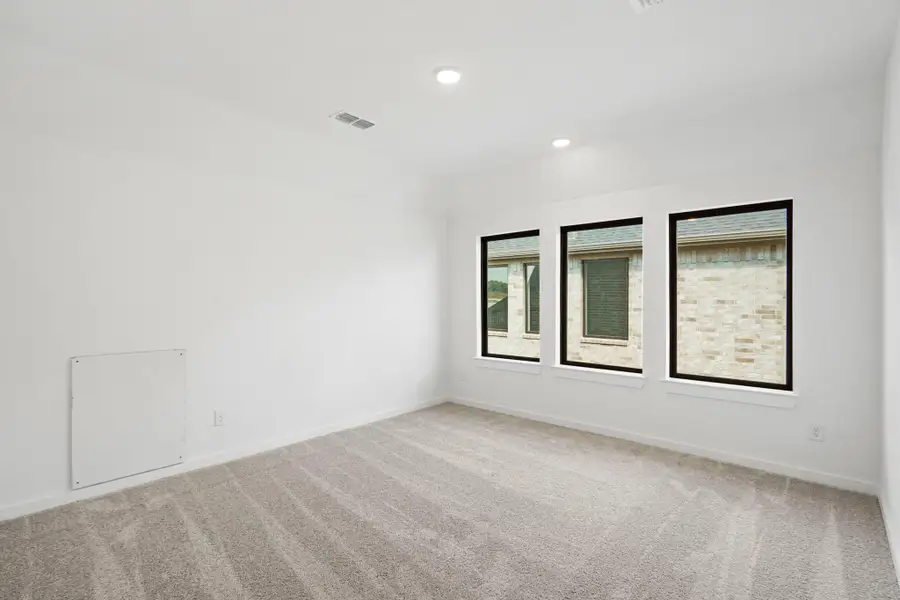 ** REPRESENTATION PHOTO OF THE SAME FLOOR PLAN, FINISHES WILL VARY** Upstairs gameroom right by the media room is an entertainer's dream!