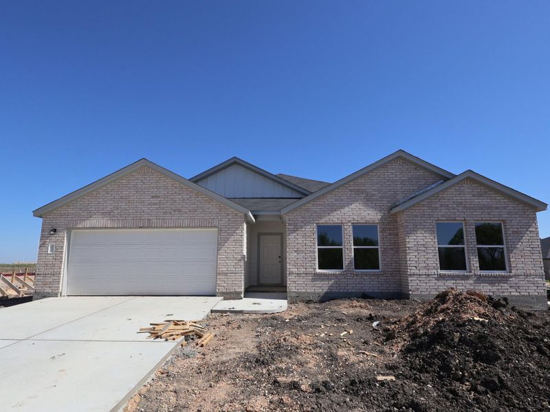 In-progress construction of a new home in Carillon, Manor, TX (Image 11).