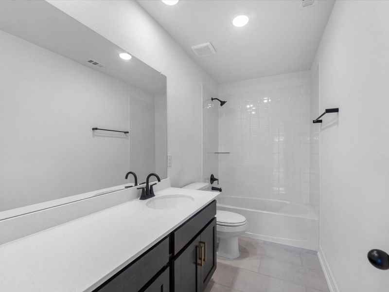 Secondary bathroom. Sample product photo. Actual exterior and interior selections may vary by homesite. Photo may be virtually staged. Secondary bathroom. Sample product photo. Actual exterior and interior selections may vary by homesite. Photo may be virtually staged.