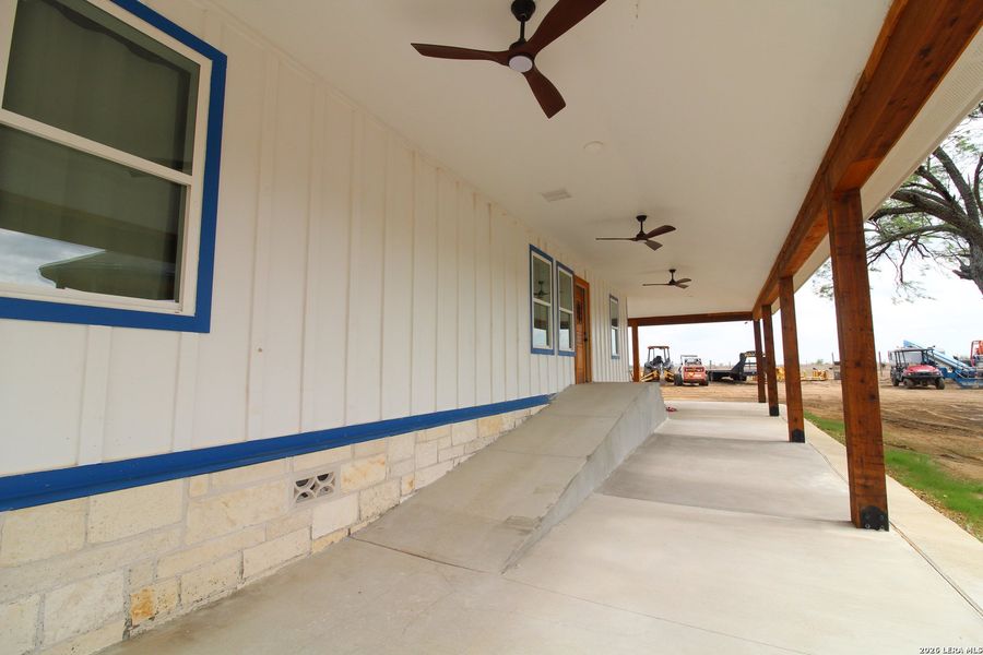 Exterior details and patio area of a home in , Floresville (Image 23).