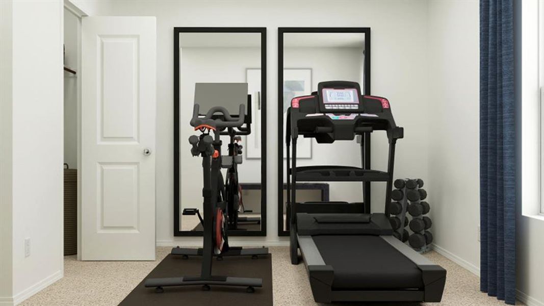 Workout area featuring baseboards