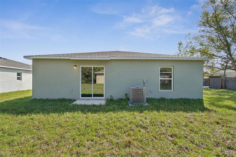 Exterior details and patio area of a home in Marion Oaks, Ocala (Image 3).