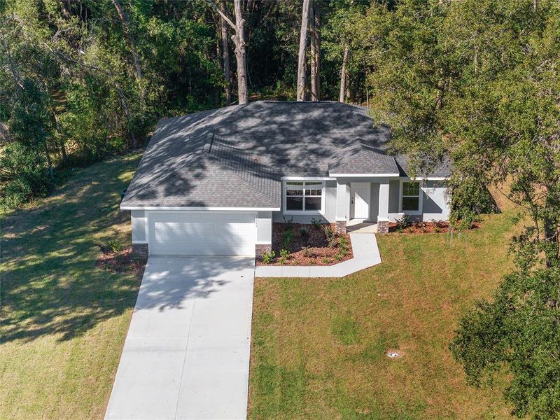 Front exterior of a new home in , Dunnellon, FL, highlighting curb appeal (Image 23). Front exterior of a new home in , Dunnellon, FL, highlighting curb appeal (Image 23).