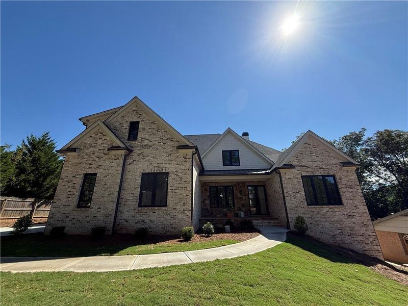 Front exterior of a new home in , Marietta, GA, highlighting curb appeal (Image 2).