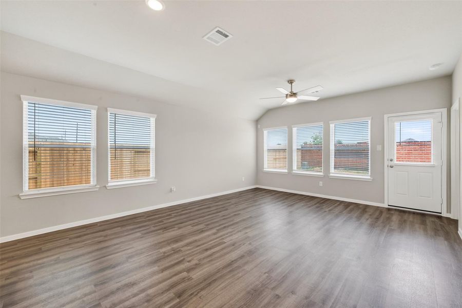 Spacious, unfurnished interior of a new home in Sunterra, Katy (Image 33).