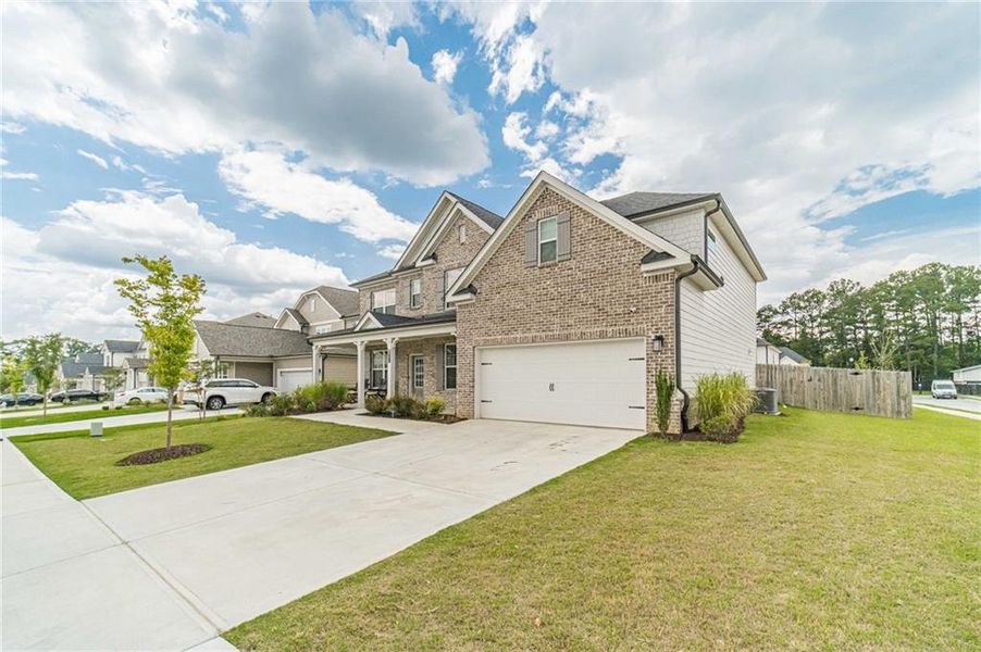 Front exterior of a new home in , Grayson, GA, highlighting curb appeal (Image 28). Front exterior of a new home in , Grayson, GA, highlighting curb appeal (Image 28).