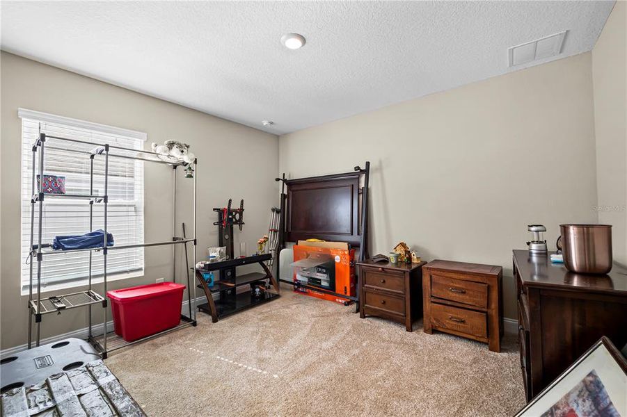 Furnished interior view inside a new home in Sawmill Branch, Palm Coast (Image 18).