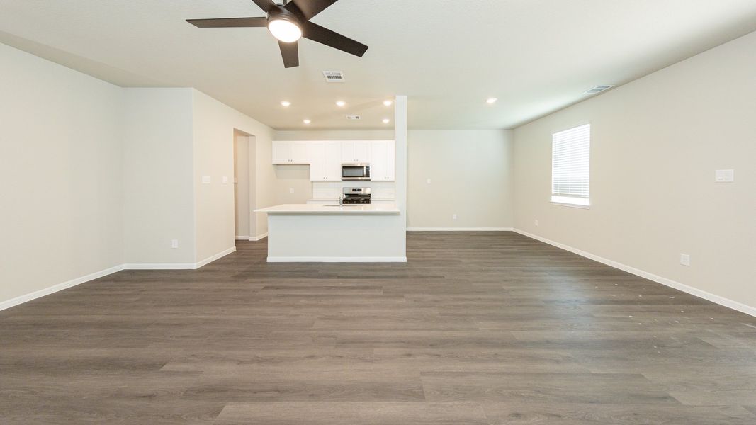 Family Room to Dining Area and Kitchen Family Room to Dining Area and Kitchen