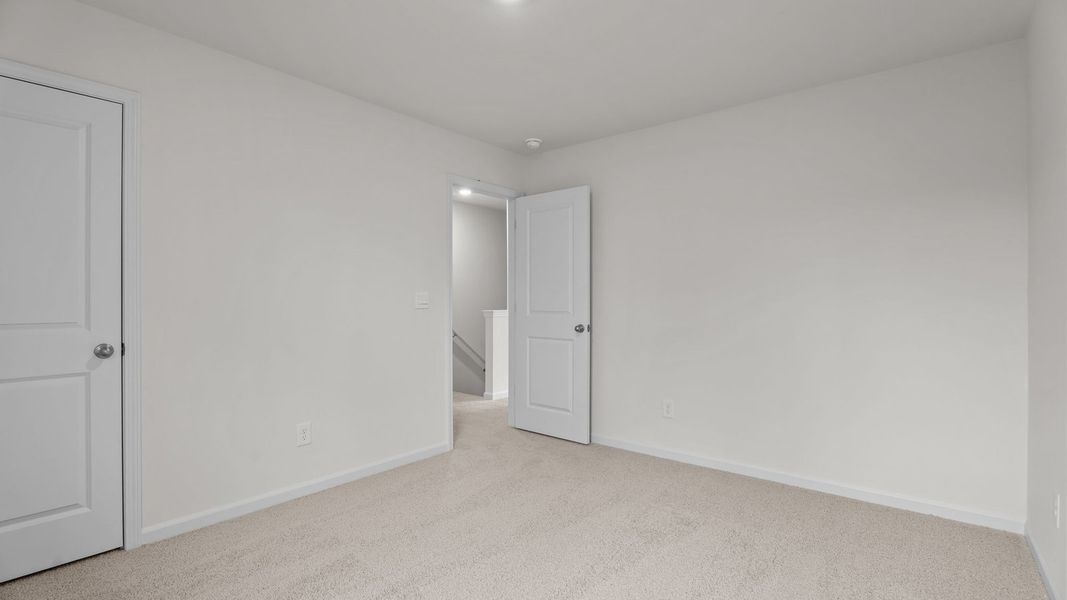 Representative unfurnished interior of a home built from the Rachel by D.R. Horton in Hobbs Farm, Ayden (Image 24).