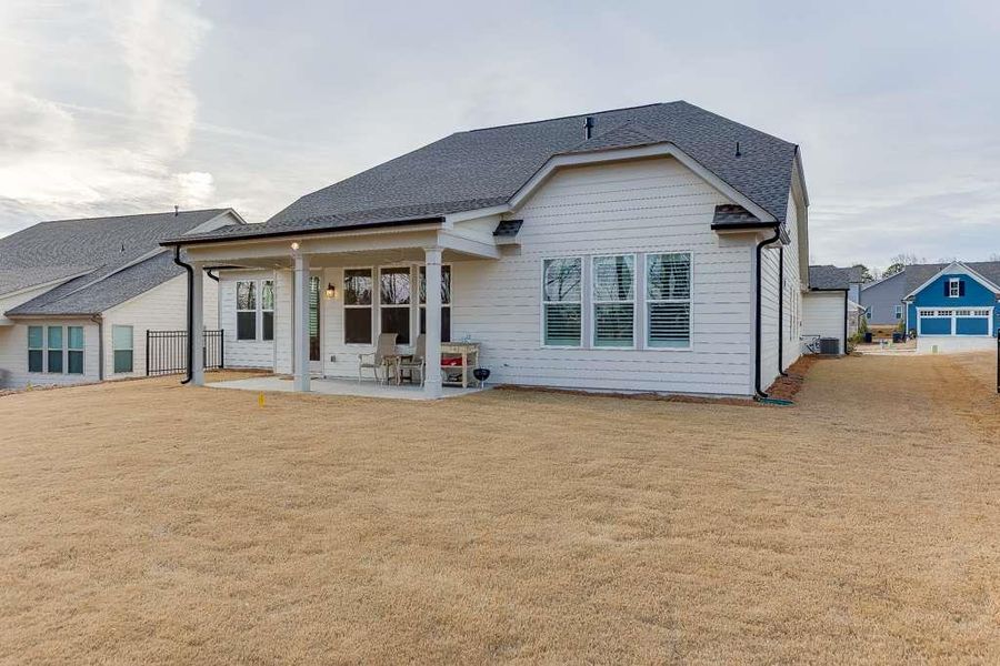 Exterior details and patio area of a home in , Hoschton (Image 24).